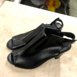 Black fish net heels